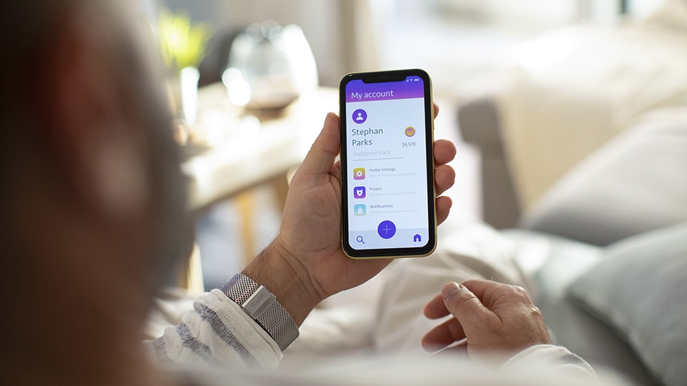 A person on their money management app.
