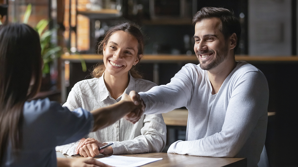 A couple negotiating their interest rate