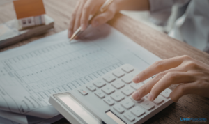 Calculating expenses with documents and calculator